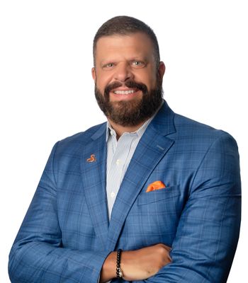 Portrait of John Tomljanovic, REALTOR®.